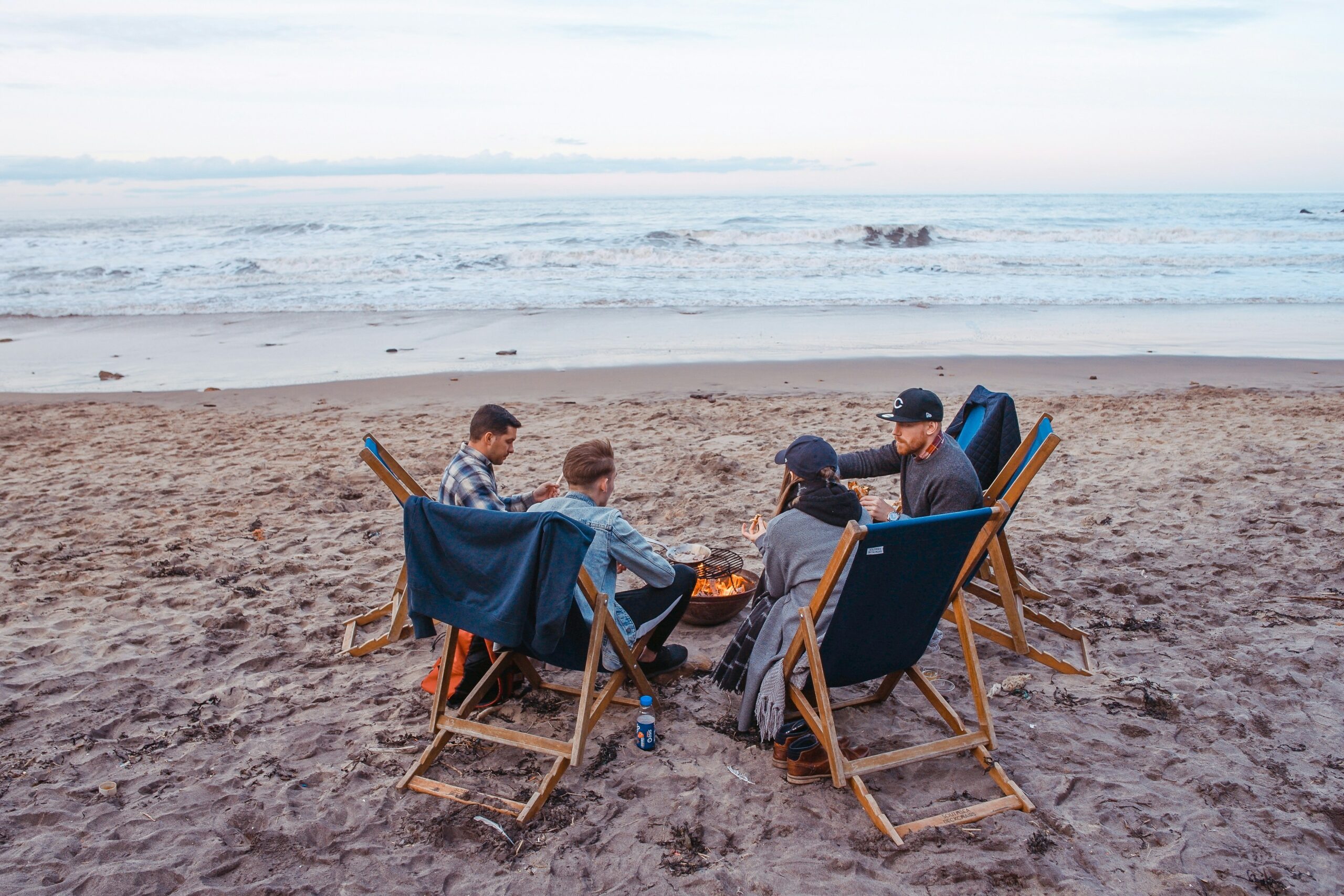 friends talking on beach